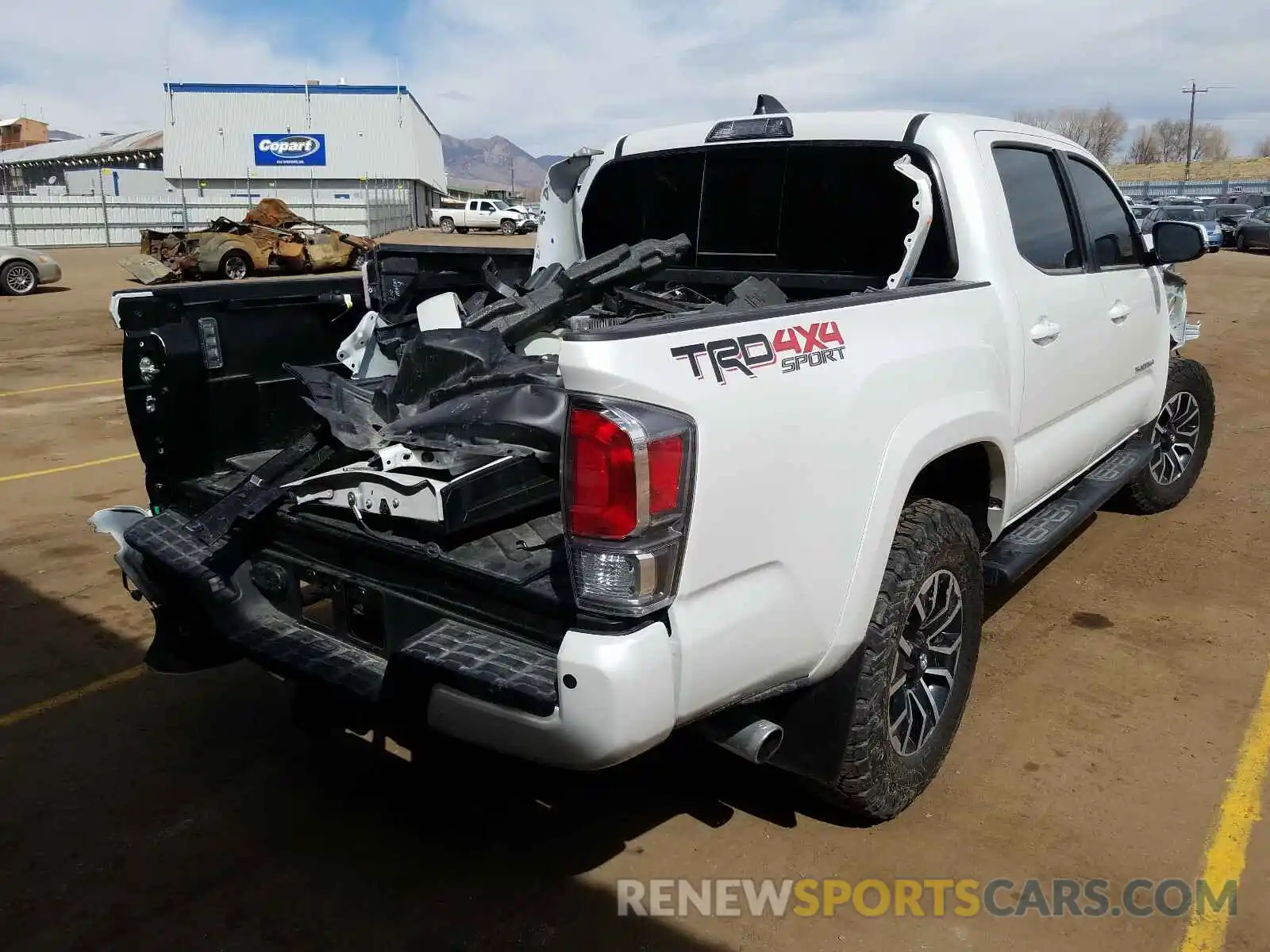 4 Photograph of a damaged car 3TYCZ5AN7MT012938 TOYOTA TACOMA 2021