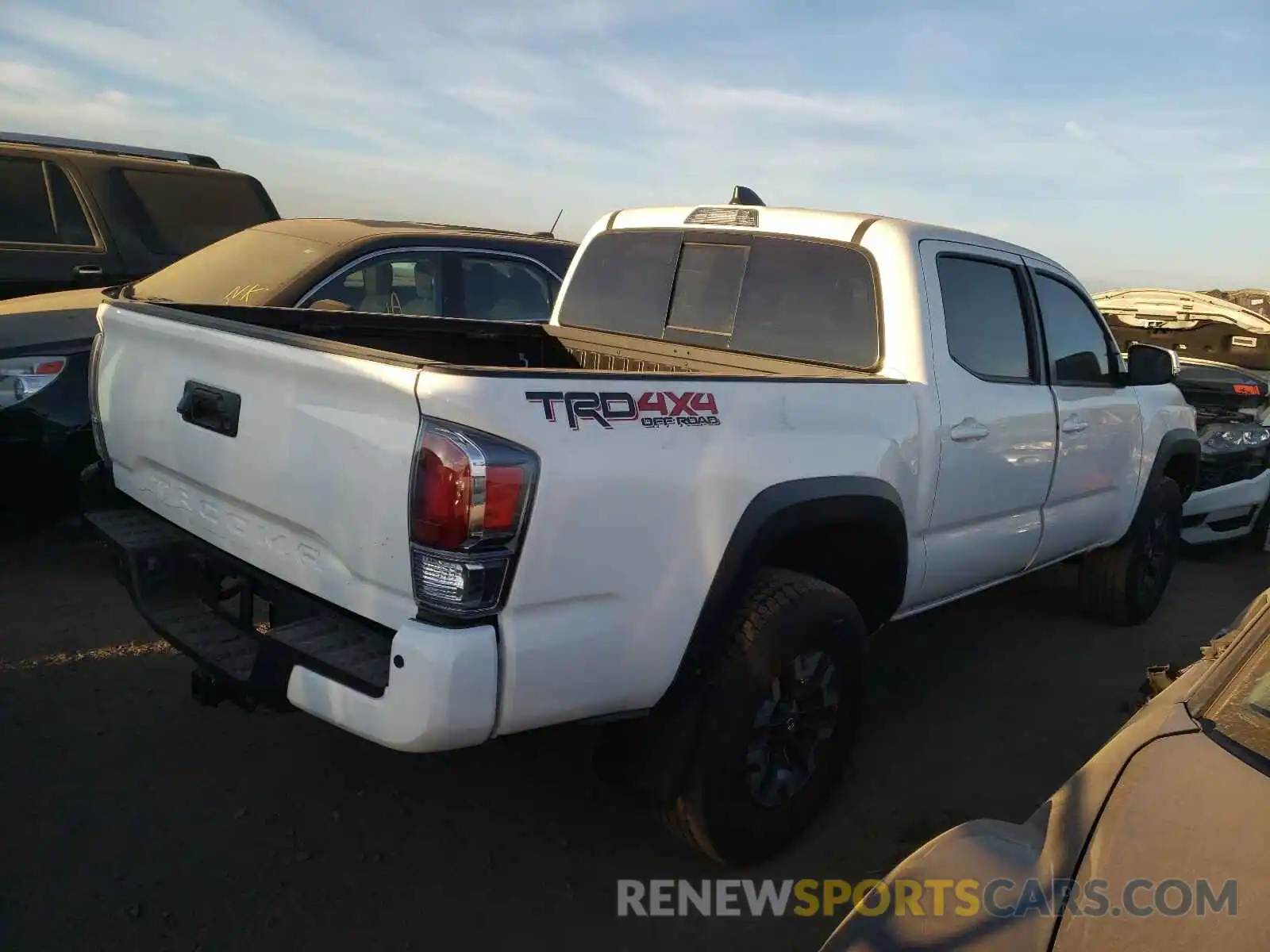 4 Photograph of a damaged car 3TYCZ5AN7MT047883 TOYOTA TACOMA 2021