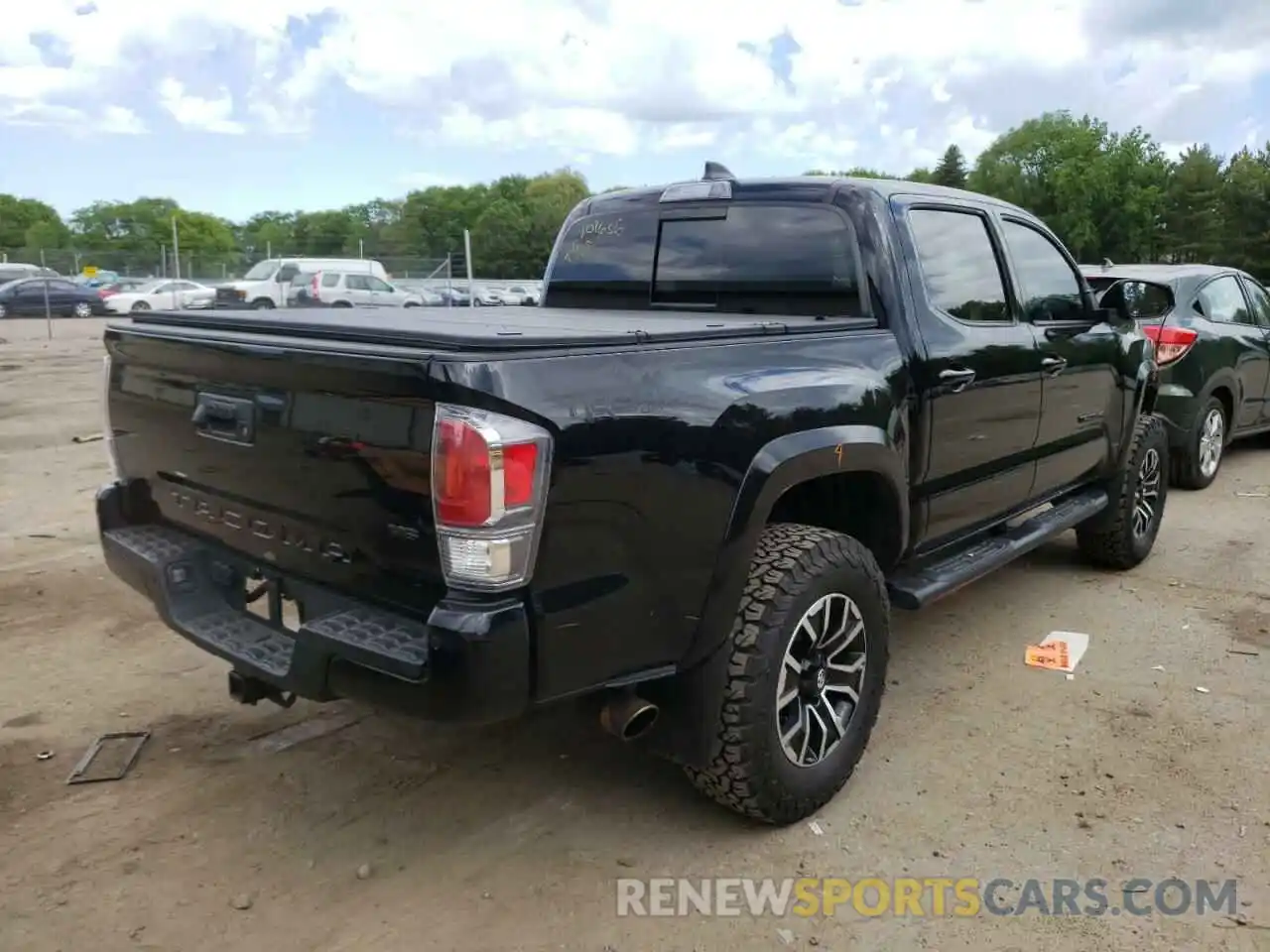 4 Photograph of a damaged car 3TYCZ5AN9MT022354 TOYOTA TACOMA 2021