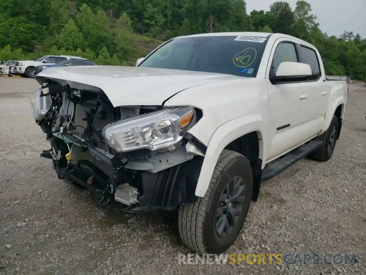 2 Photograph of a damaged car 3TYCZ5ANXMT041110 TOYOTA TACOMA 2021