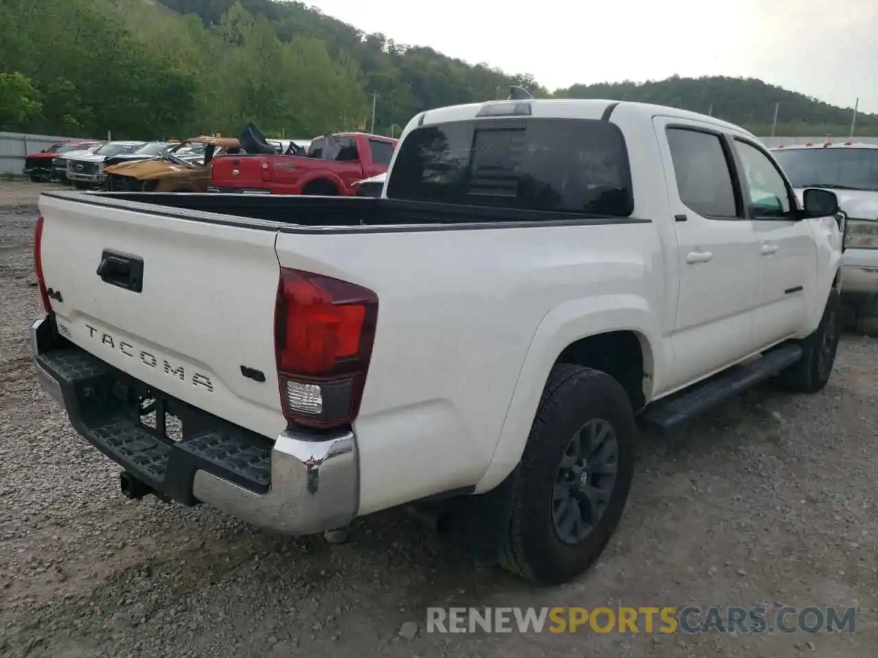 4 Photograph of a damaged car 3TYCZ5ANXMT041110 TOYOTA TACOMA 2021