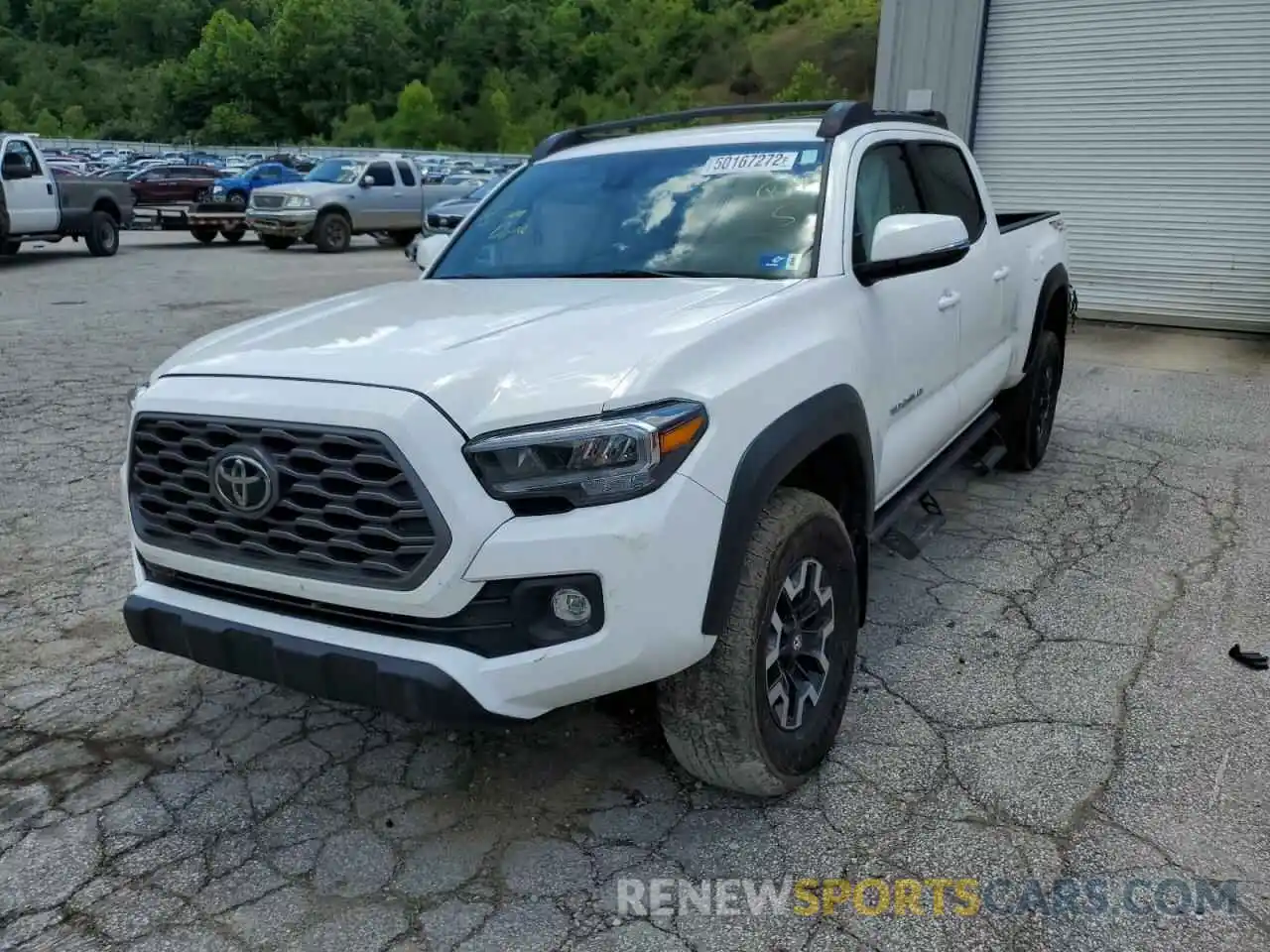 2 Photograph of a damaged car 3TYDZ5BN0MT002724 TOYOTA TACOMA 2021