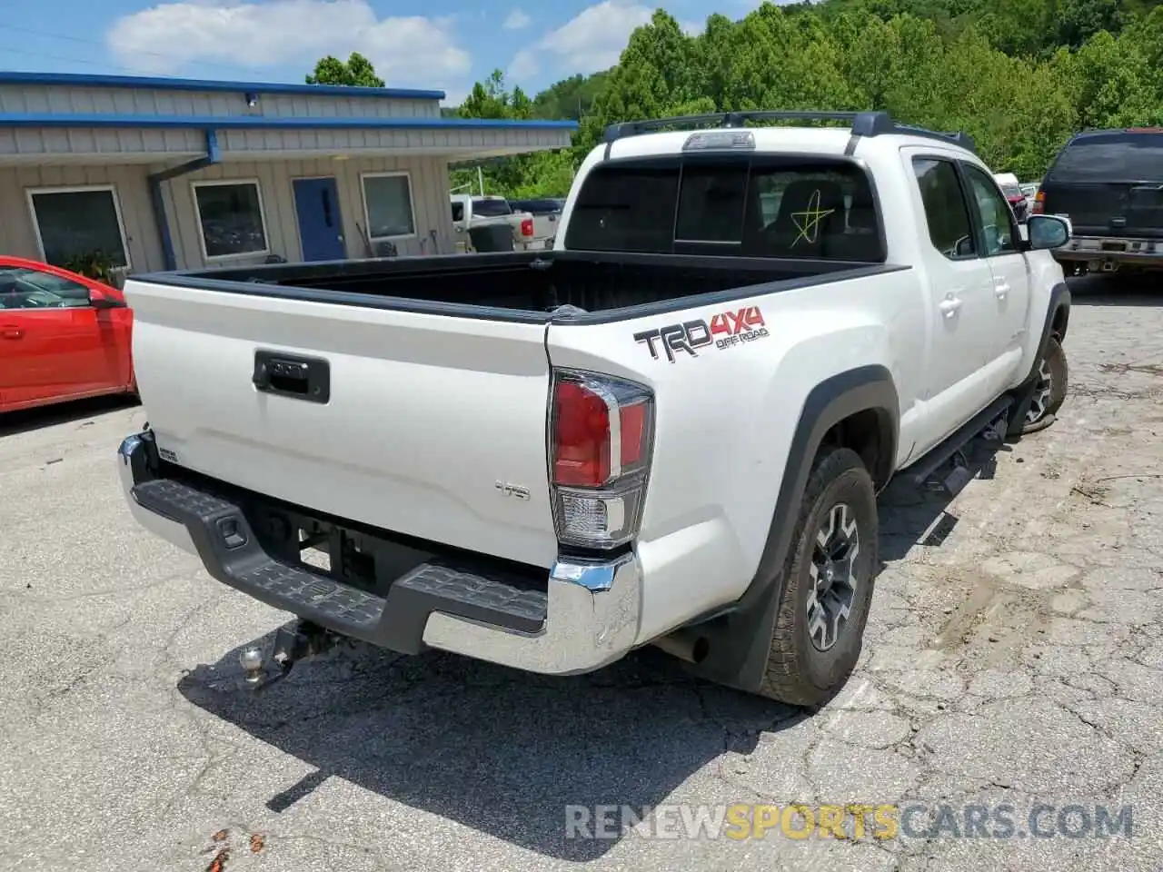 4 Photograph of a damaged car 3TYDZ5BN0MT002724 TOYOTA TACOMA 2021