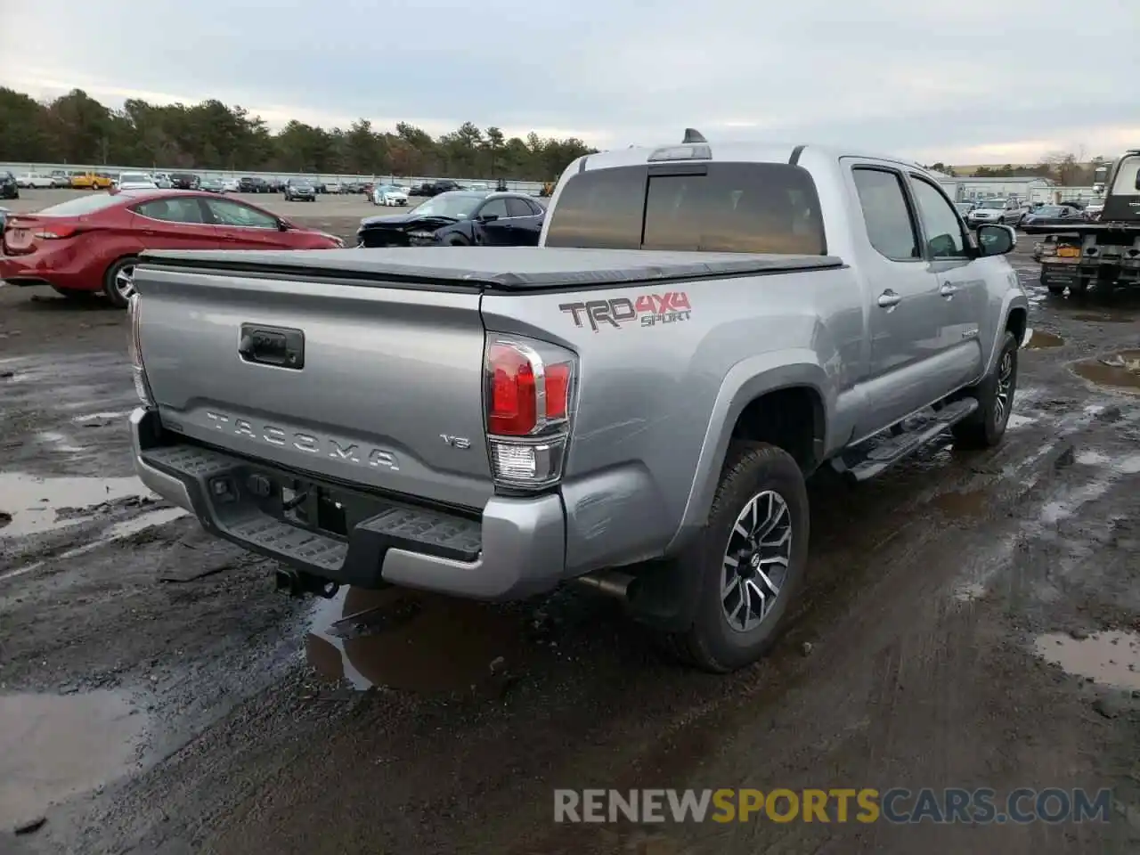 4 Photograph of a damaged car 3TYDZ5BN3MT004130 TOYOTA TACOMA 2021