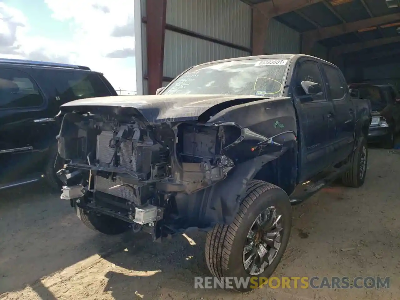 2 Photograph of a damaged car 3TYEZ5CN0MT010700 TOYOTA TACOMA 2021