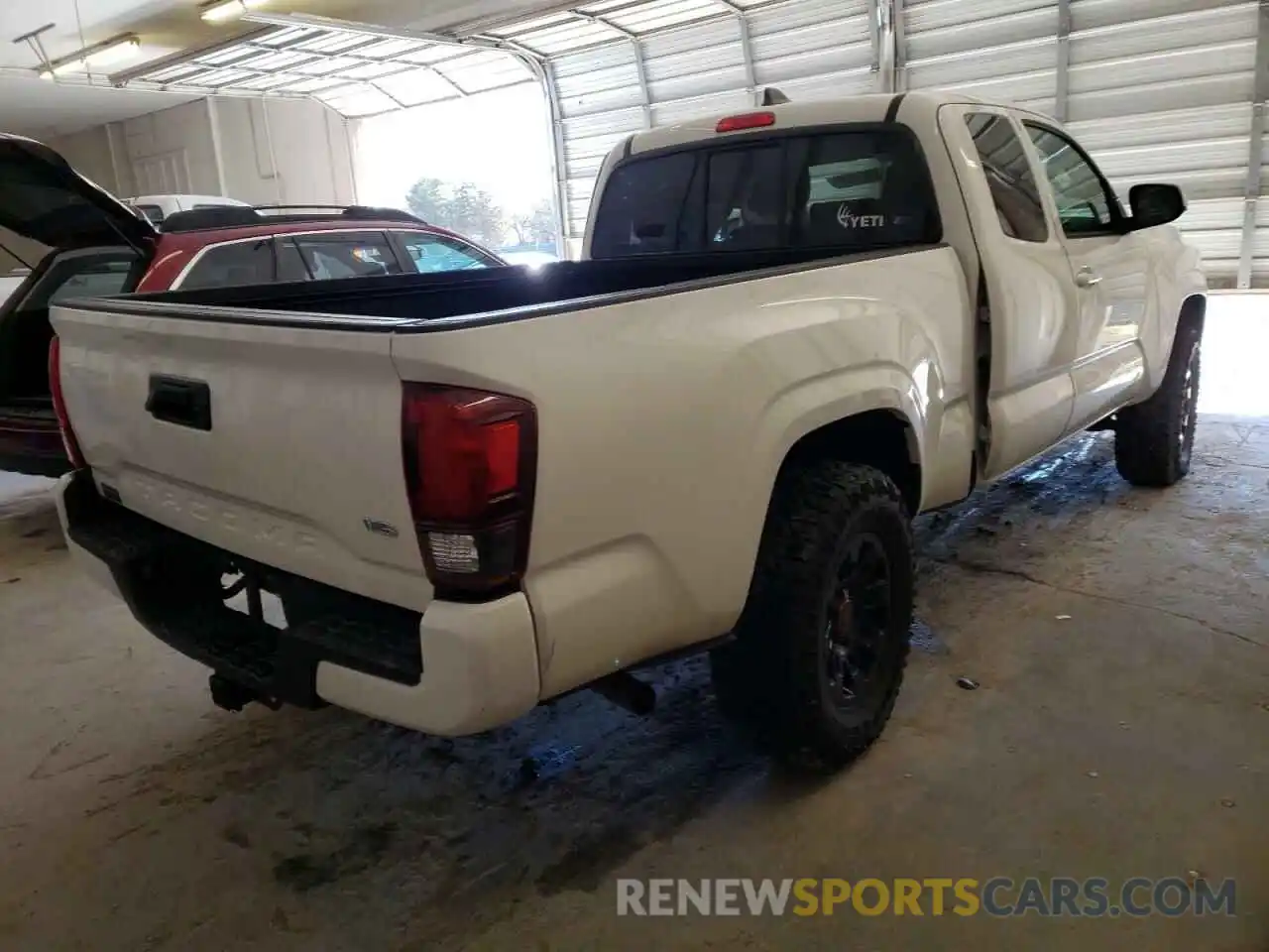 4 Photograph of a damaged car 3TYRZ5CN9MT010521 TOYOTA TACOMA 2021