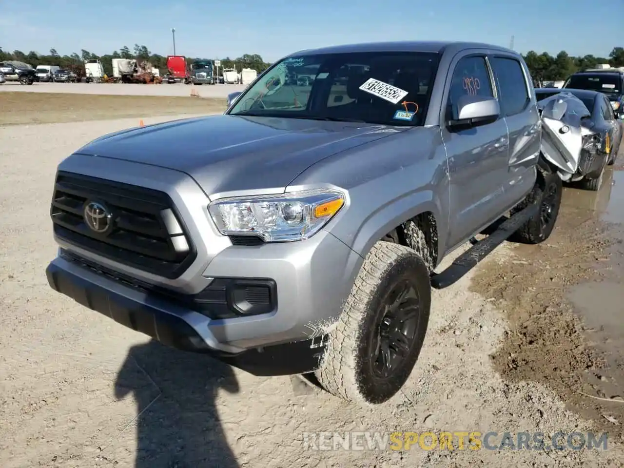 2 Photograph of a damaged car 5TFAX5GN3MX192025 TOYOTA TACOMA 2021