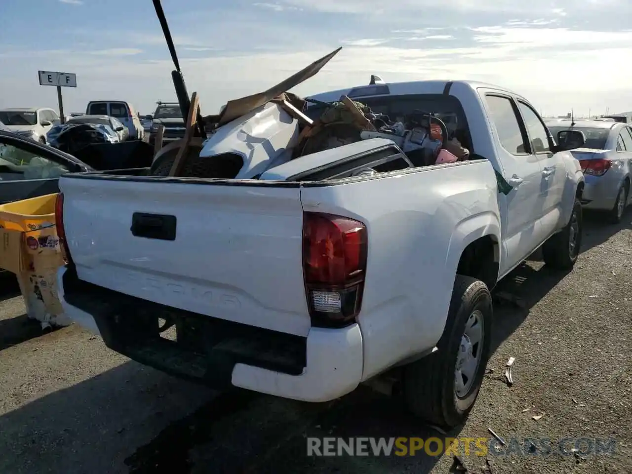 4 Photograph of a damaged car 5TFAX5GN4MX188856 TOYOTA TACOMA 2021