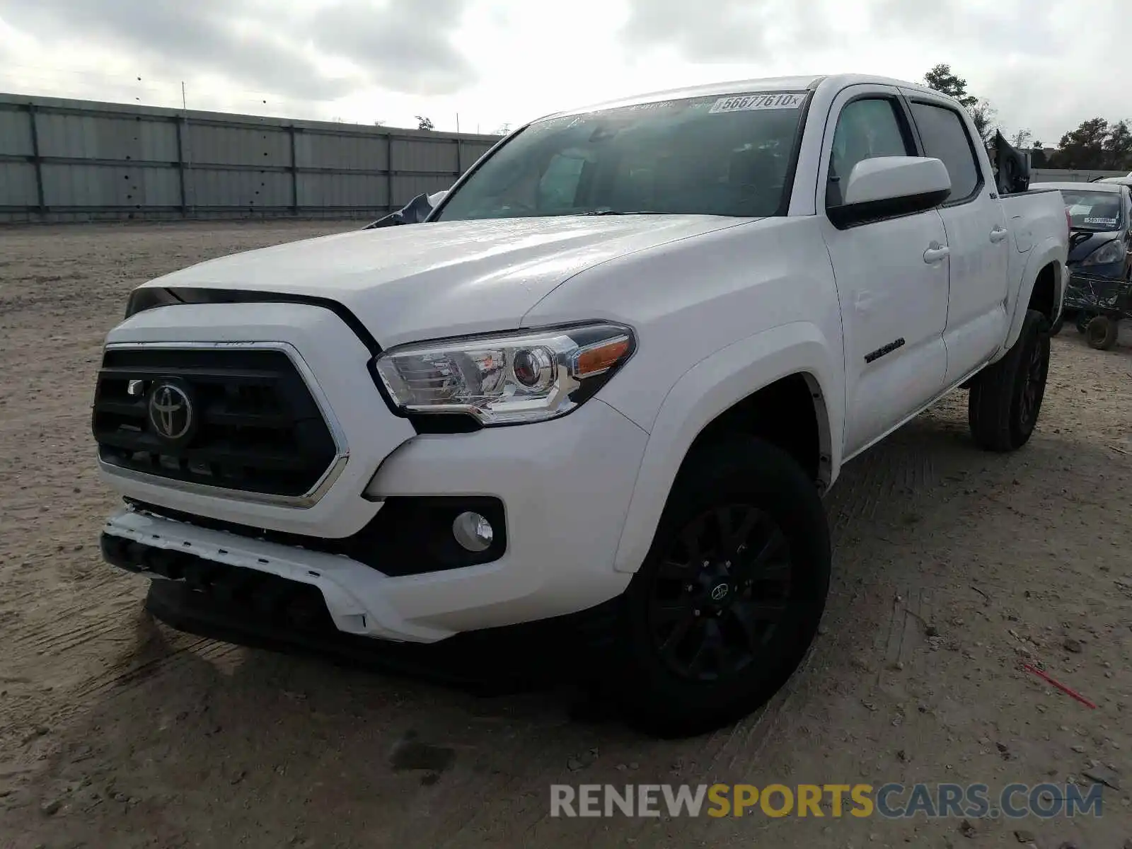 2 Photograph of a damaged car 5TFAX5GN5MX189904 TOYOTA TACOMA 2021