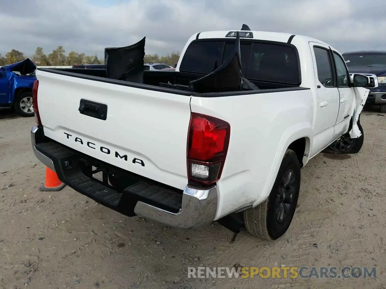 4 Photograph of a damaged car 5TFAX5GN5MX189904 TOYOTA TACOMA 2021