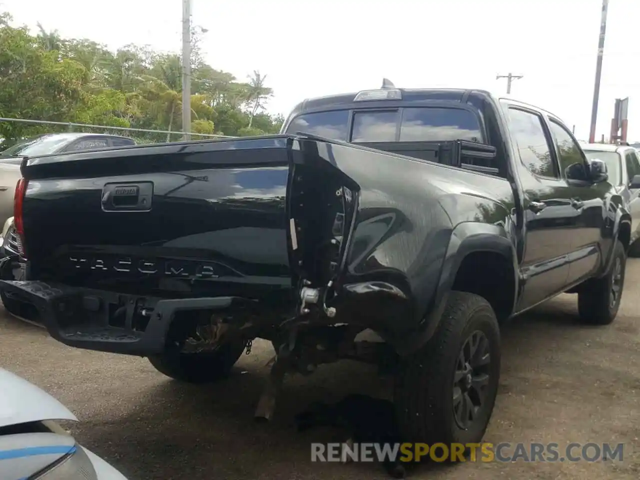 4 Photograph of a damaged car 5TFAX5GN5MX193645 TOYOTA TACOMA 2021