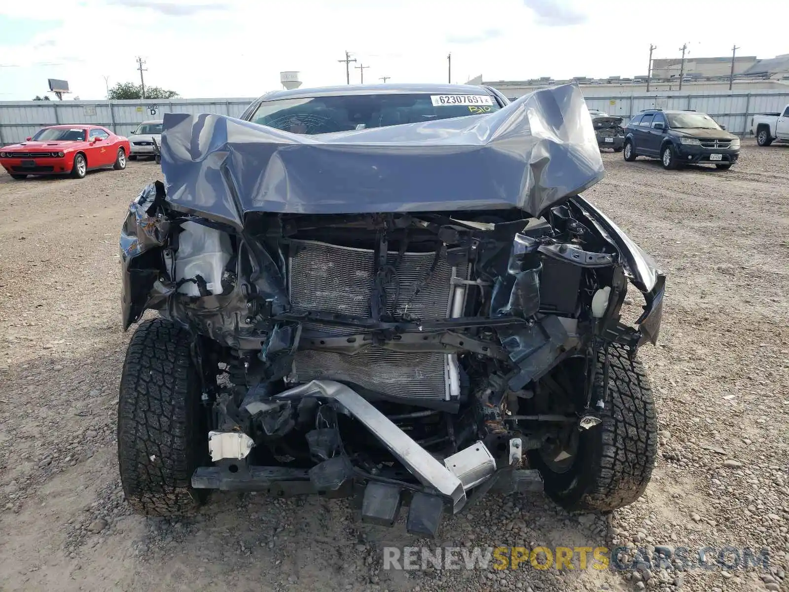 7 Photograph of a damaged car 5TFAX5GN7MX194280 TOYOTA TACOMA 2021