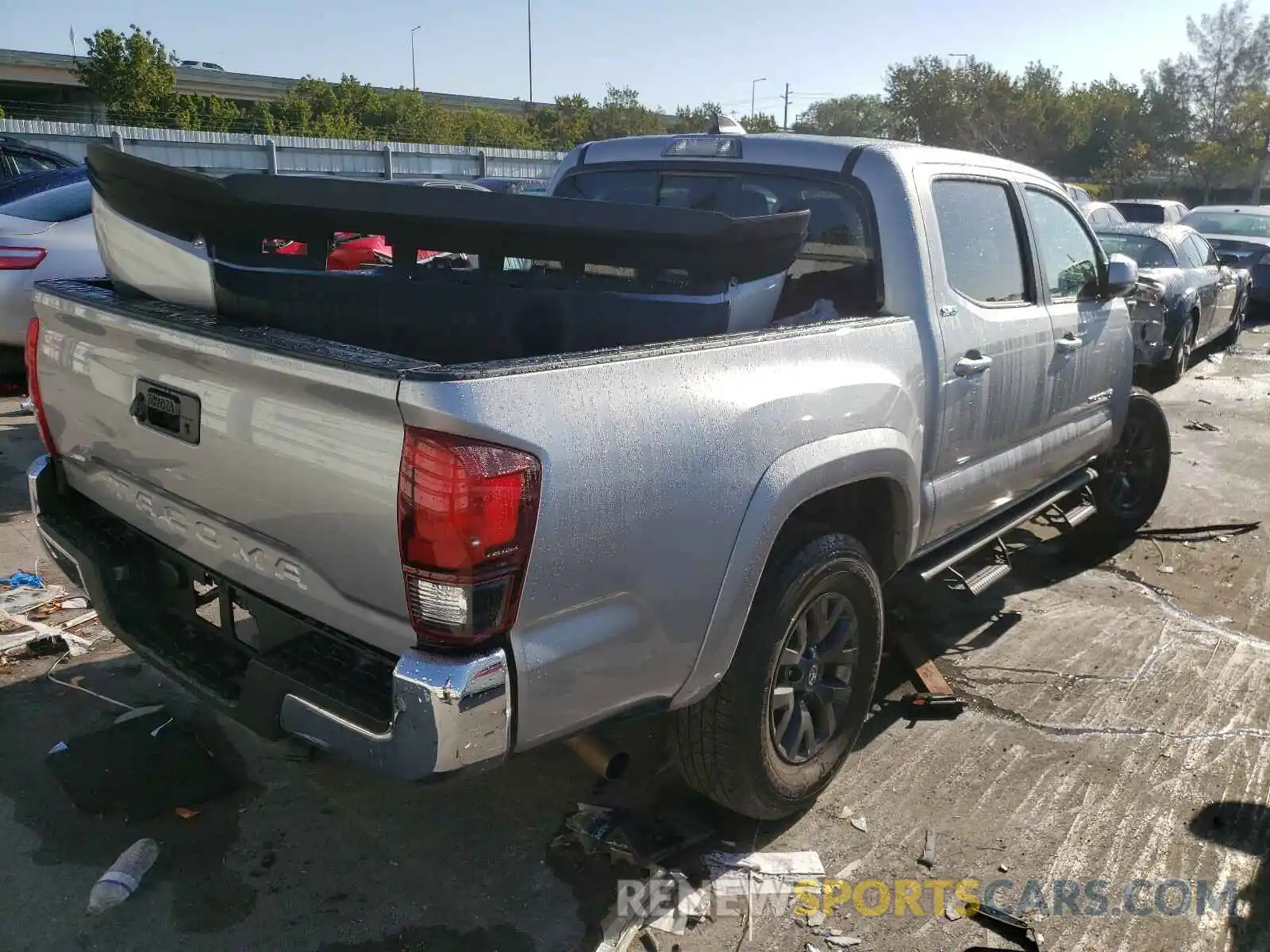 4 Photograph of a damaged car 5TFAX5GN8MX190674 TOYOTA TACOMA 2021