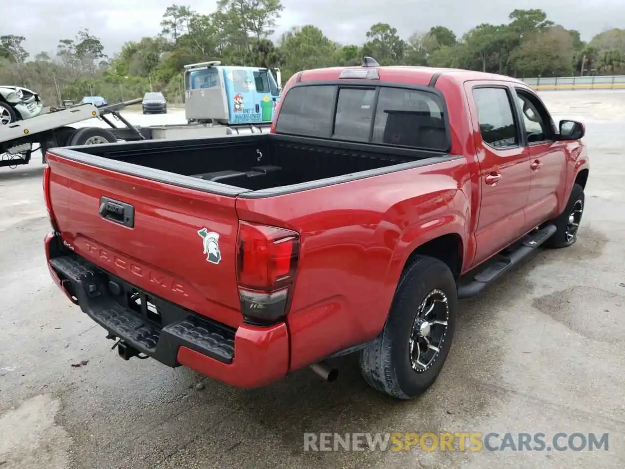 4 Photograph of a damaged car 5TFAX5GN9MX191574 TOYOTA TACOMA 2021