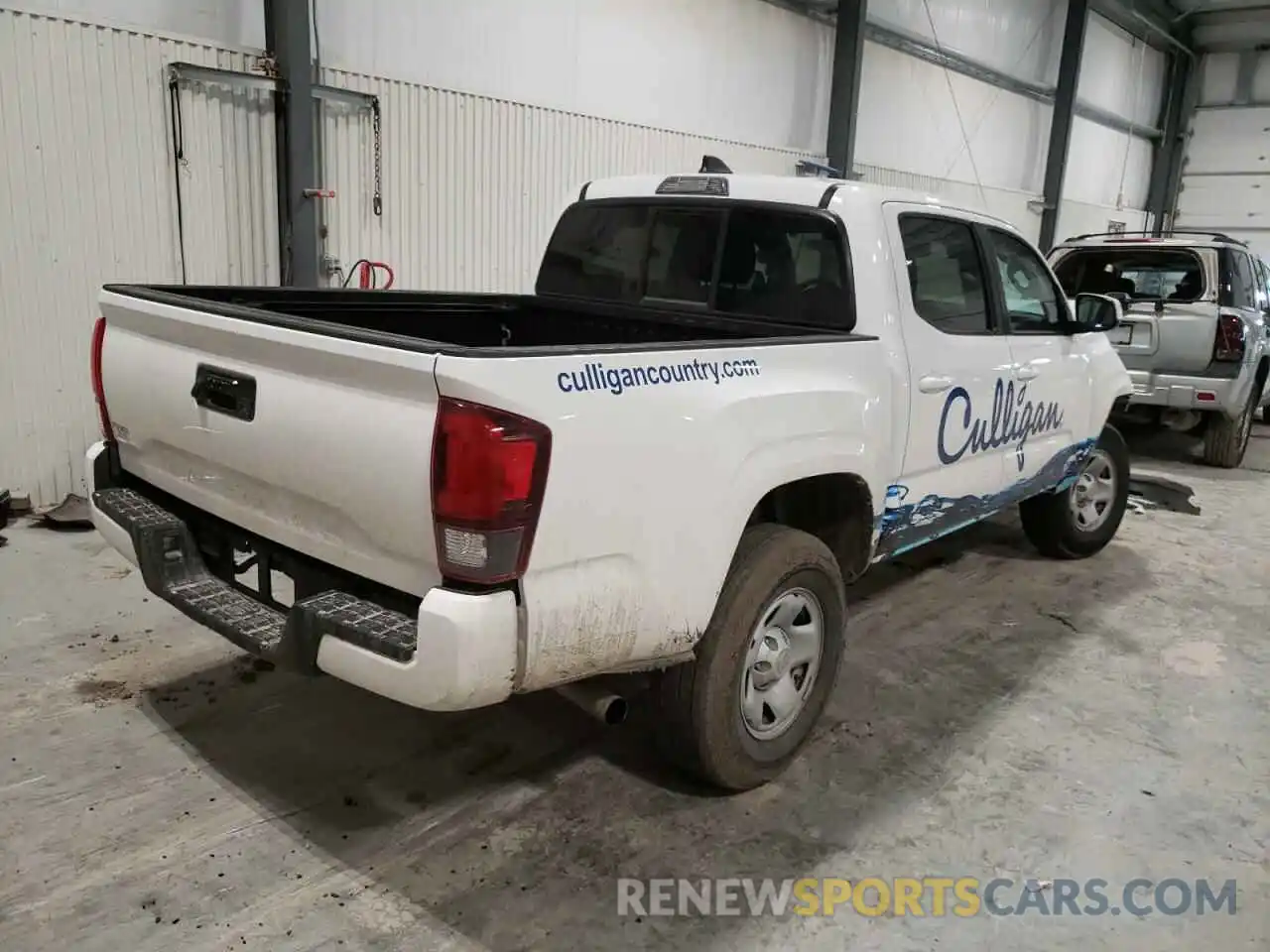 4 Photograph of a damaged car 5TFAX5GN9MX192434 TOYOTA TACOMA 2021