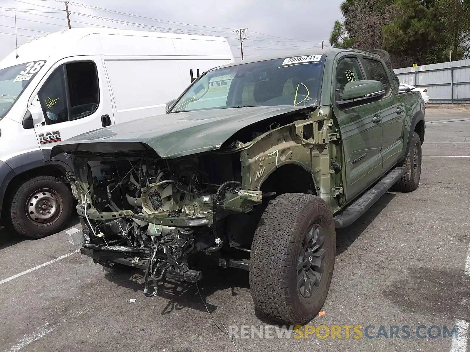 2 Photograph of a damaged car 5TFAZ5CN0MX095316 TOYOTA TACOMA 2021