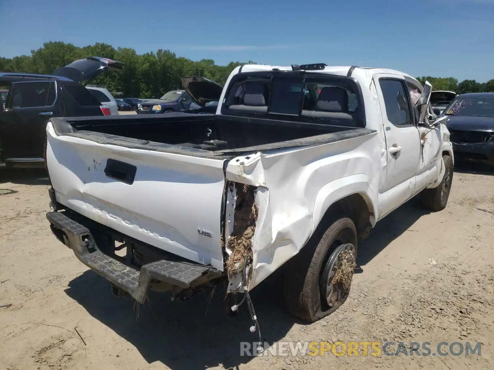 4 Photograph of a damaged car 5TFAZ5CN0MX098278 TOYOTA TACOMA 2021