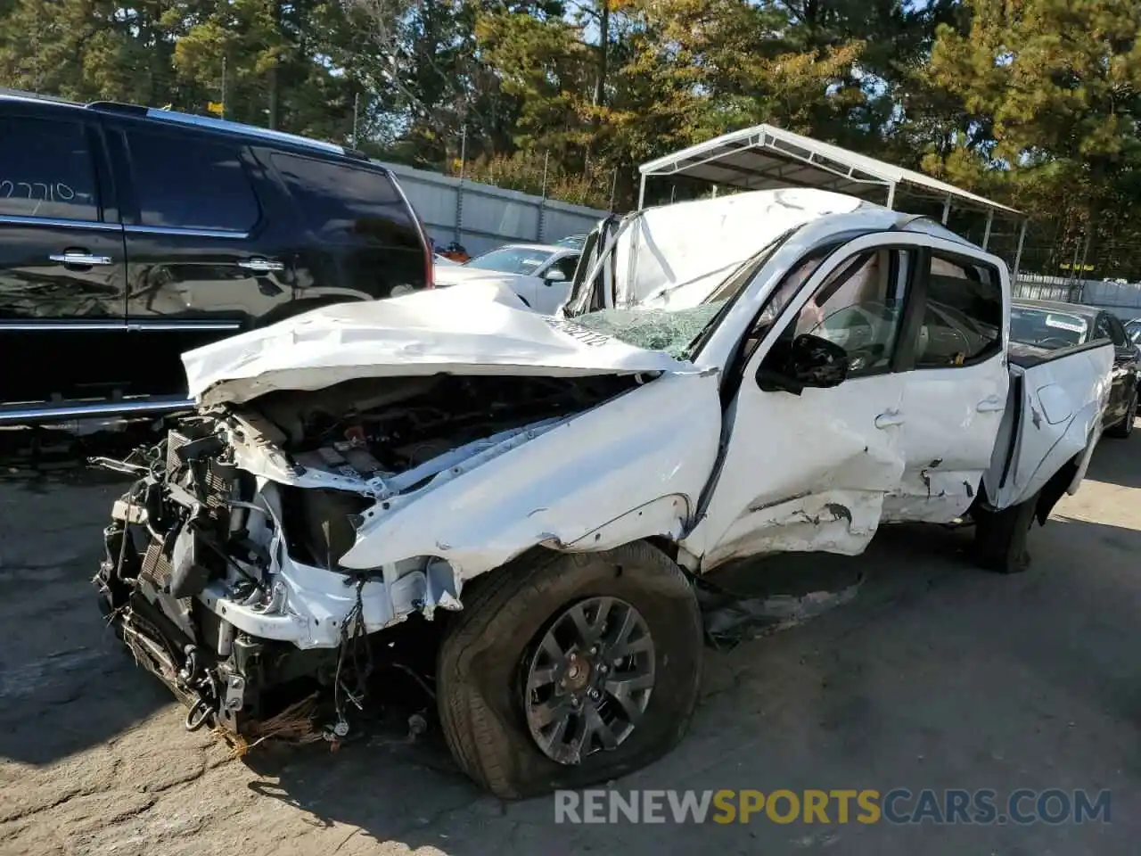 2 Photograph of a damaged car 5TFAZ5CN0MX099253 TOYOTA TACOMA 2021