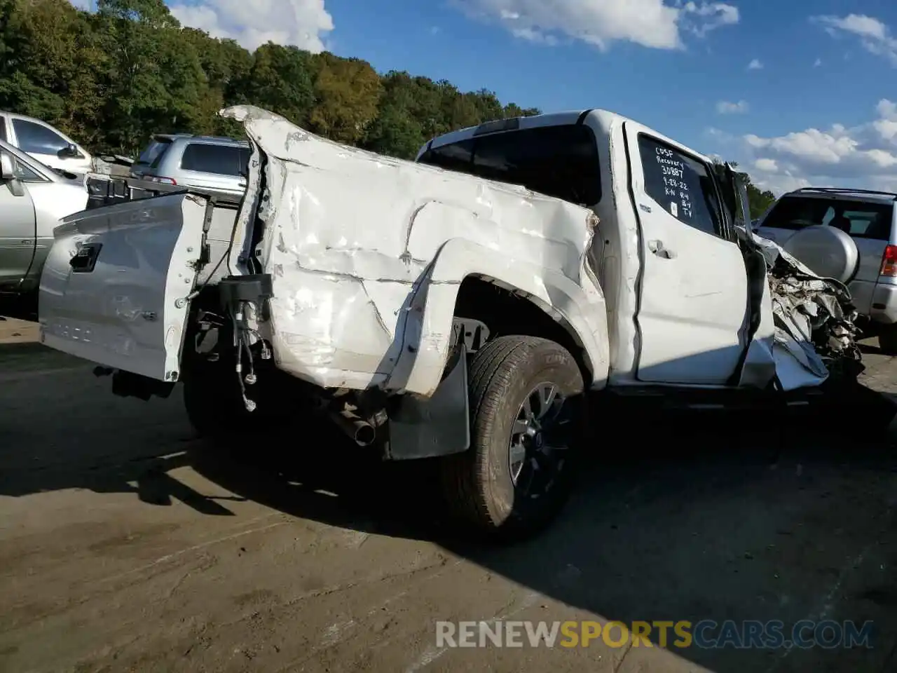 4 Photograph of a damaged car 5TFAZ5CN0MX099253 TOYOTA TACOMA 2021