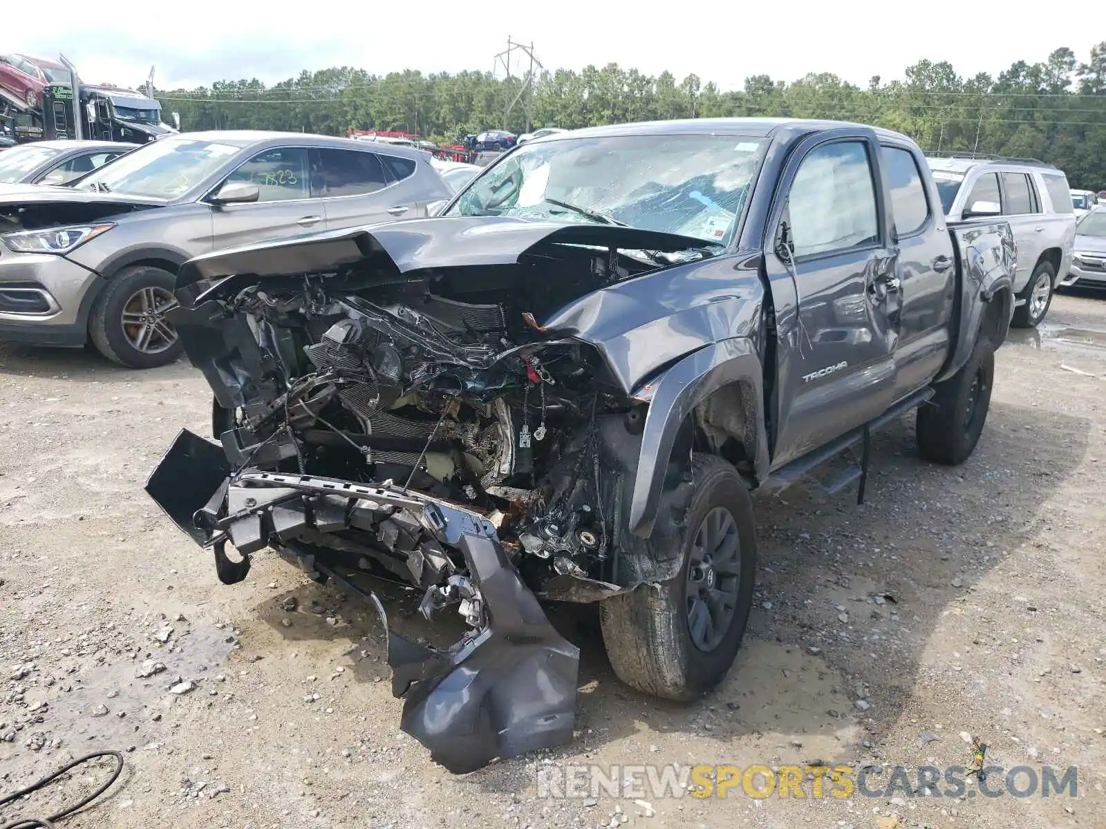 2 Photograph of a damaged car 5TFAZ5CN1MX099892 TOYOTA TACOMA 2021