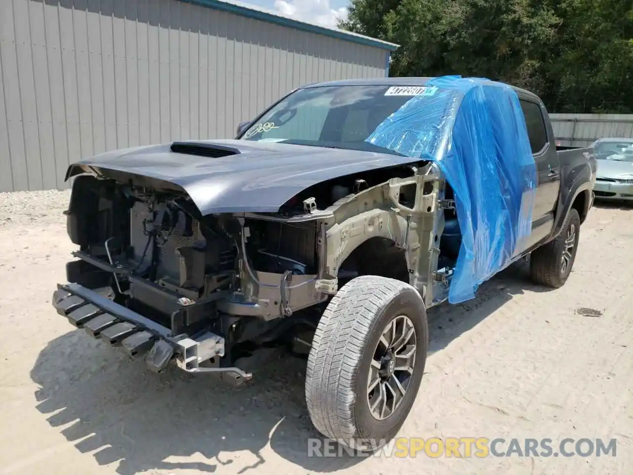 2 Photograph of a damaged car 5TFAZ5CN1MX100524 TOYOTA TACOMA 2021