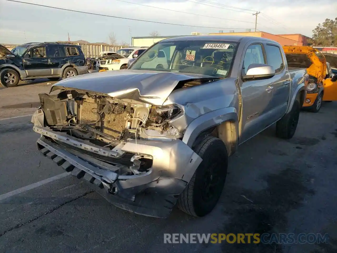 2 Photograph of a damaged car 5TFAZ5CN1MX105691 TOYOTA TACOMA 2021