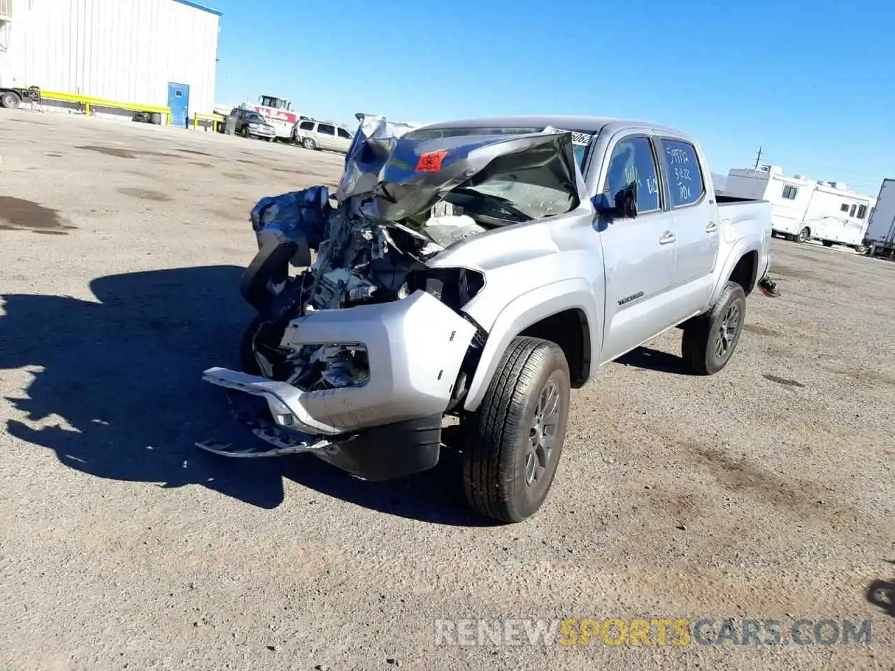 2 Photograph of a damaged car 5TFAZ5CN1MX116965 TOYOTA TACOMA 2021