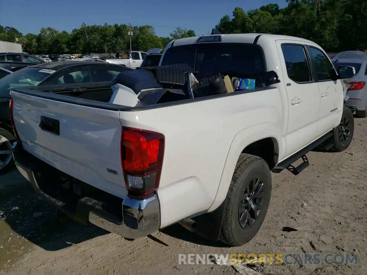 4 Photograph of a damaged car 5TFAZ5CN2MX100340 TOYOTA TACOMA 2021