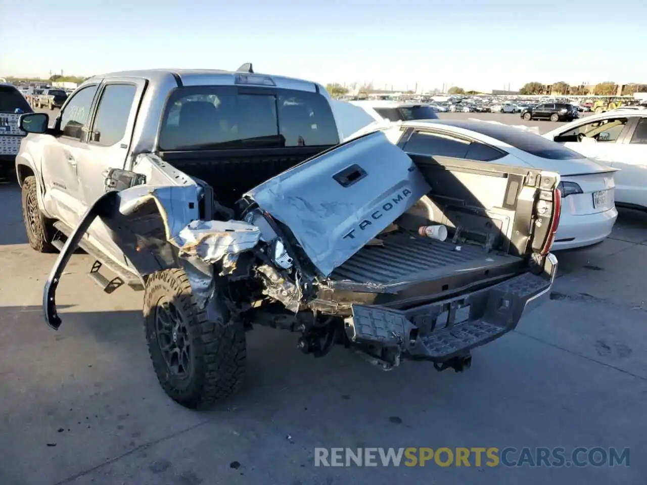 3 Photograph of a damaged car 5TFAZ5CN2MX105621 TOYOTA TACOMA 2021