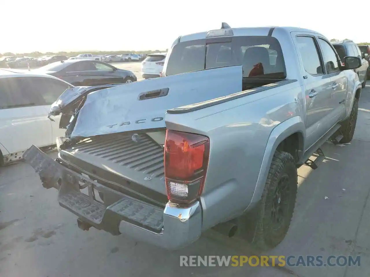 4 Photograph of a damaged car 5TFAZ5CN2MX105621 TOYOTA TACOMA 2021