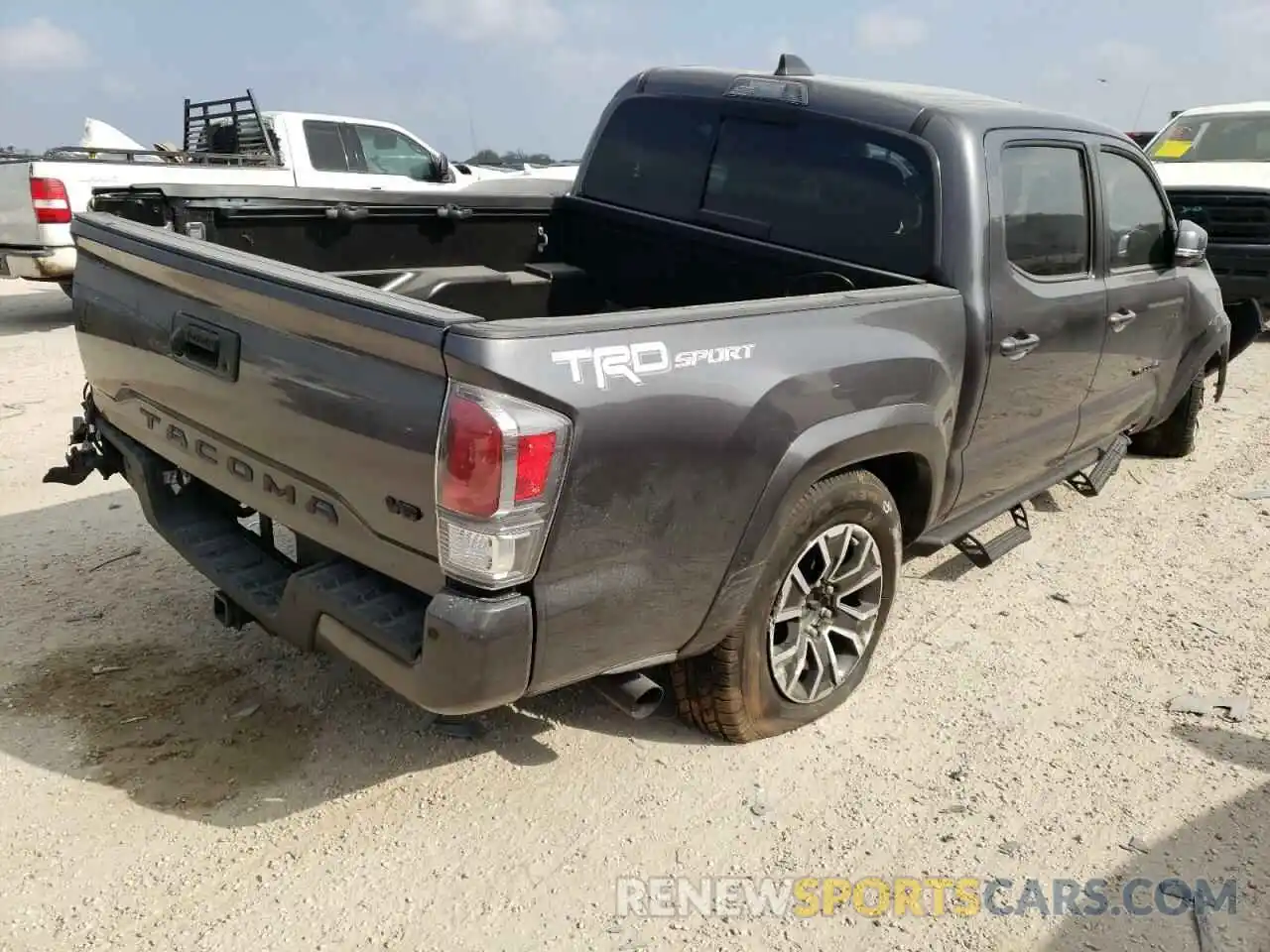 4 Photograph of a damaged car 5TFAZ5CN2MX107529 TOYOTA TACOMA 2021