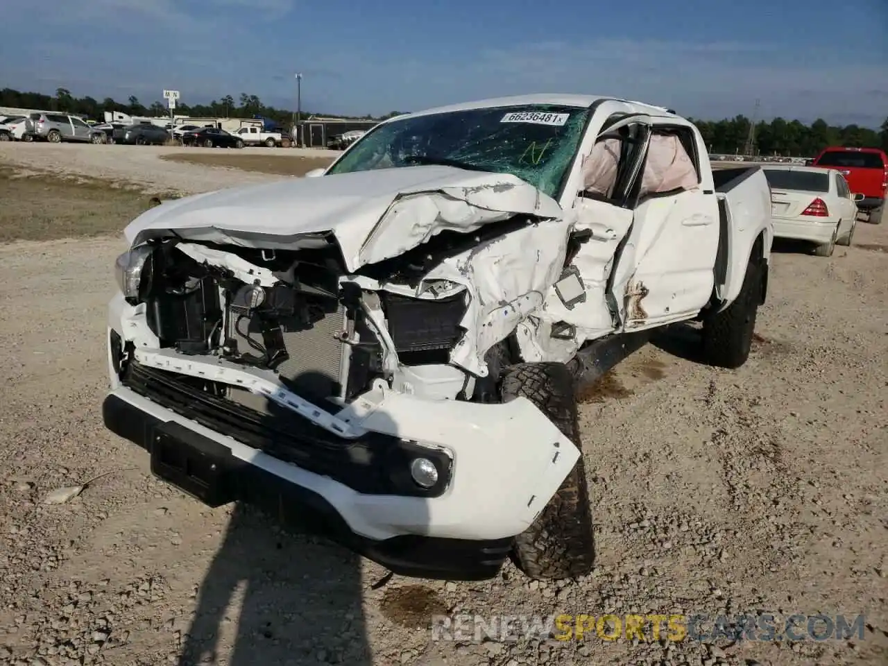 2 Photograph of a damaged car 5TFAZ5CN2MX107756 TOYOTA TACOMA 2021