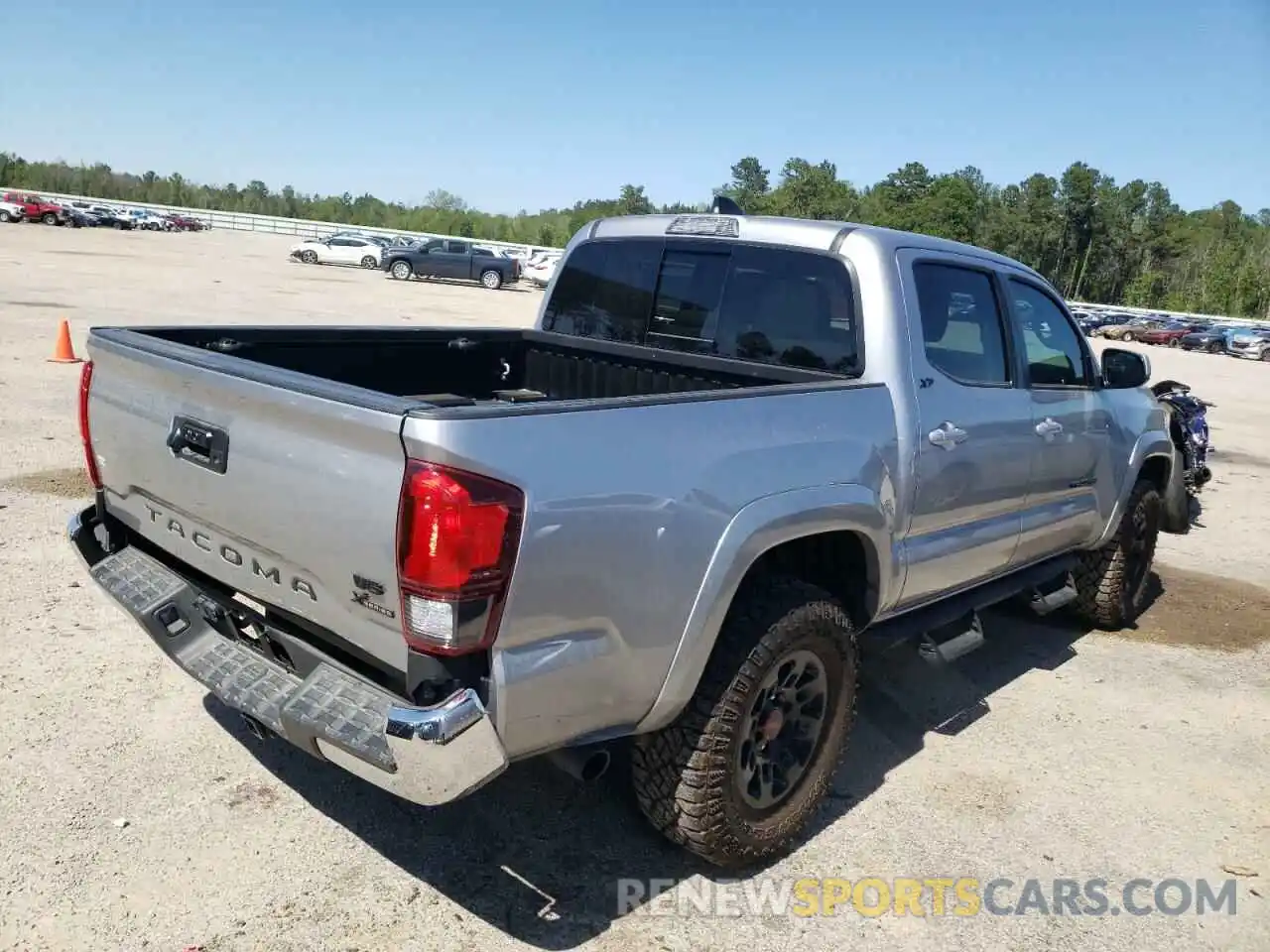 4 Photograph of a damaged car 5TFAZ5CN2MX109023 TOYOTA TACOMA 2021