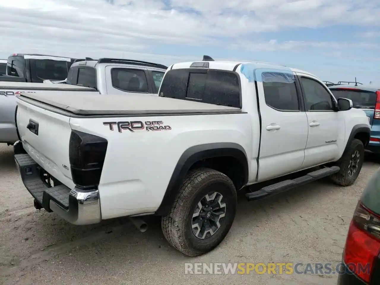 4 Photograph of a damaged car 5TFAZ5CN2MX114271 TOYOTA TACOMA 2021