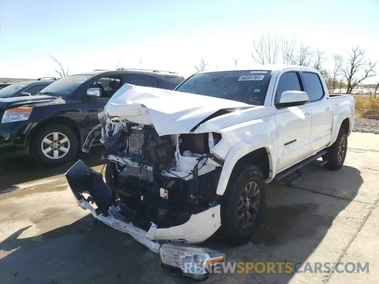 2 Photograph of a damaged car 5TFAZ5CN2MX114688 TOYOTA TACOMA 2021