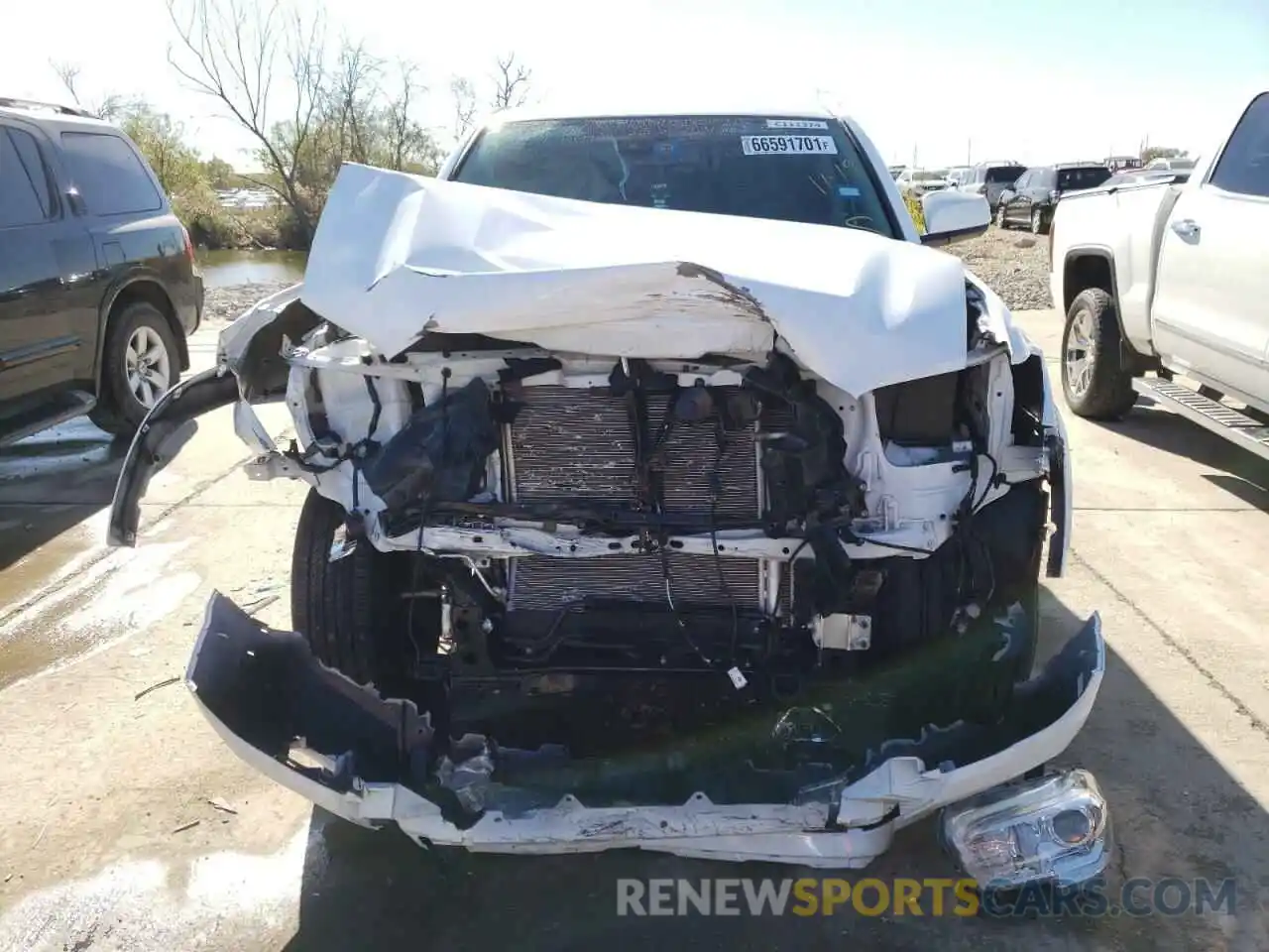 9 Photograph of a damaged car 5TFAZ5CN2MX114688 TOYOTA TACOMA 2021