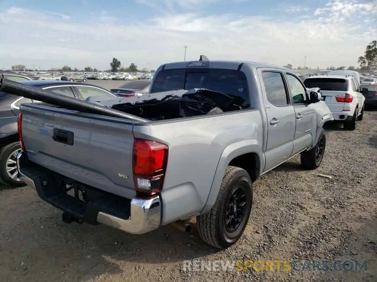 4 Photograph of a damaged car 5TFAZ5CN2MX117560 TOYOTA TACOMA 2021