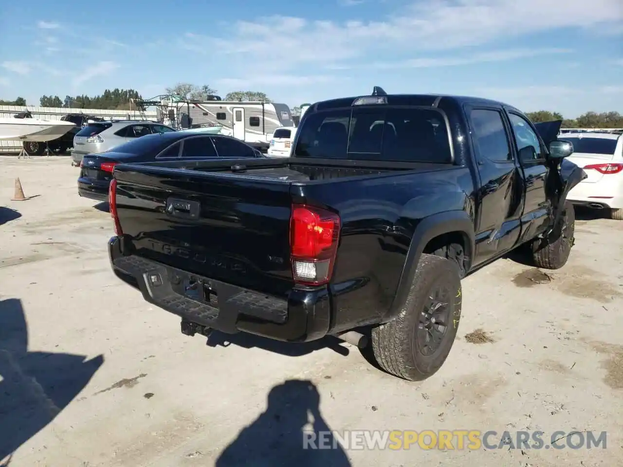 4 Photograph of a damaged car 5TFAZ5CN3MX098274 TOYOTA TACOMA 2021