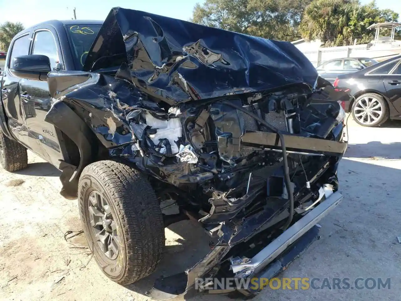 9 Photograph of a damaged car 5TFAZ5CN3MX098274 TOYOTA TACOMA 2021