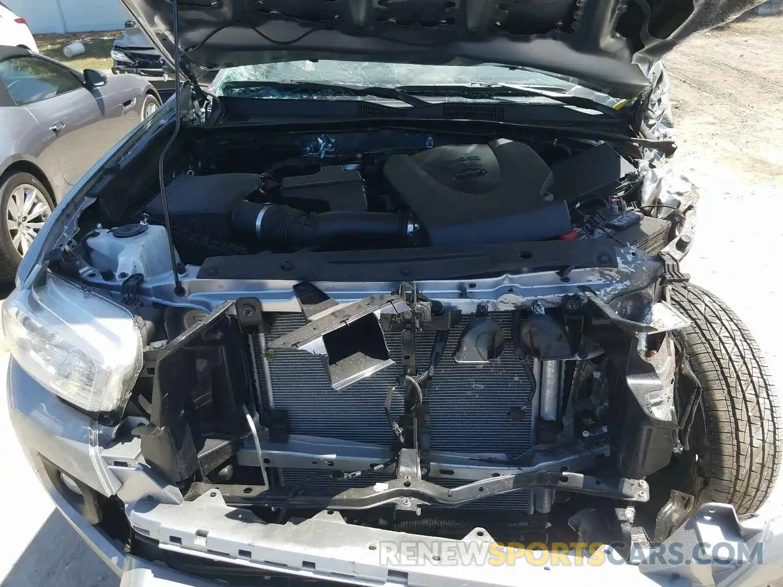 7 Photograph of a damaged car 5TFAZ5CN3MX103666 TOYOTA TACOMA 2021