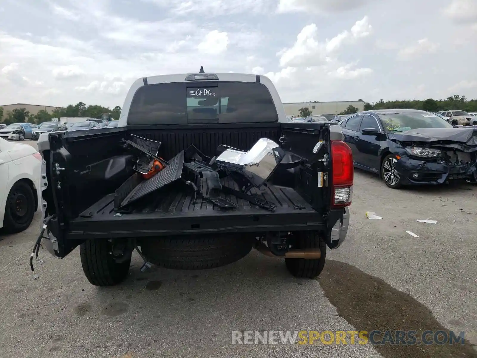 9 Photograph of a damaged car 5TFAZ5CN3MX103683 TOYOTA TACOMA 2021