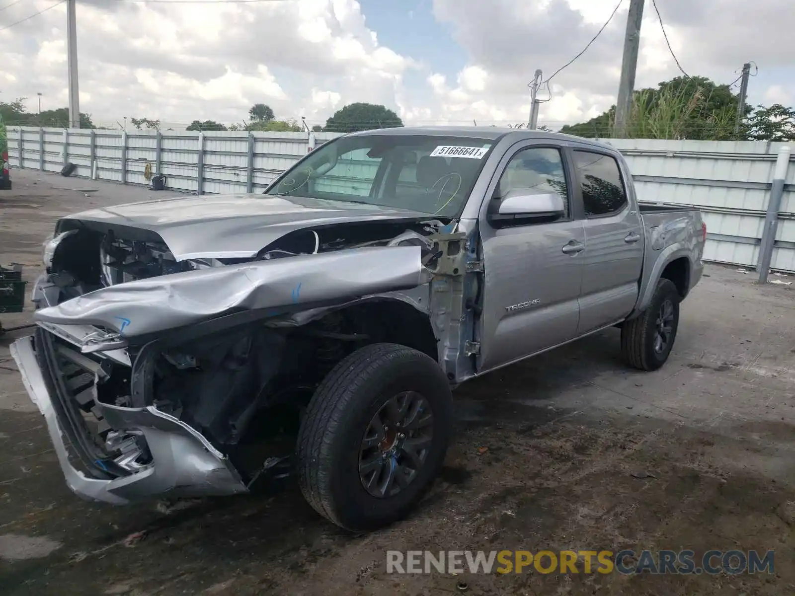 2 Photograph of a damaged car 5TFAZ5CN4MX098588 TOYOTA TACOMA 2021