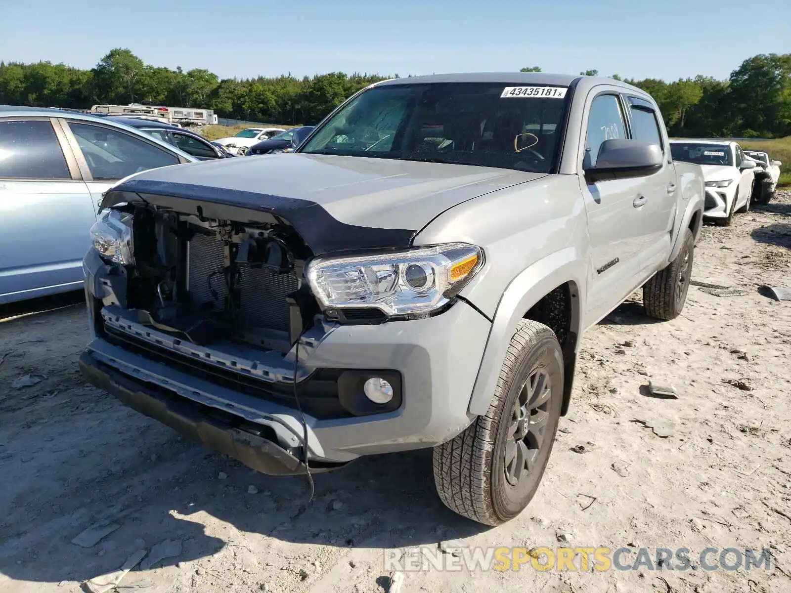 2 Photograph of a damaged car 5TFAZ5CN4MX100971 TOYOTA TACOMA 2021