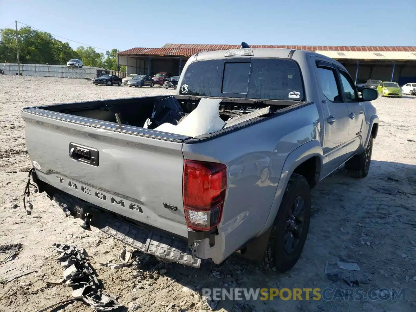 4 Photograph of a damaged car 5TFAZ5CN4MX100971 TOYOTA TACOMA 2021