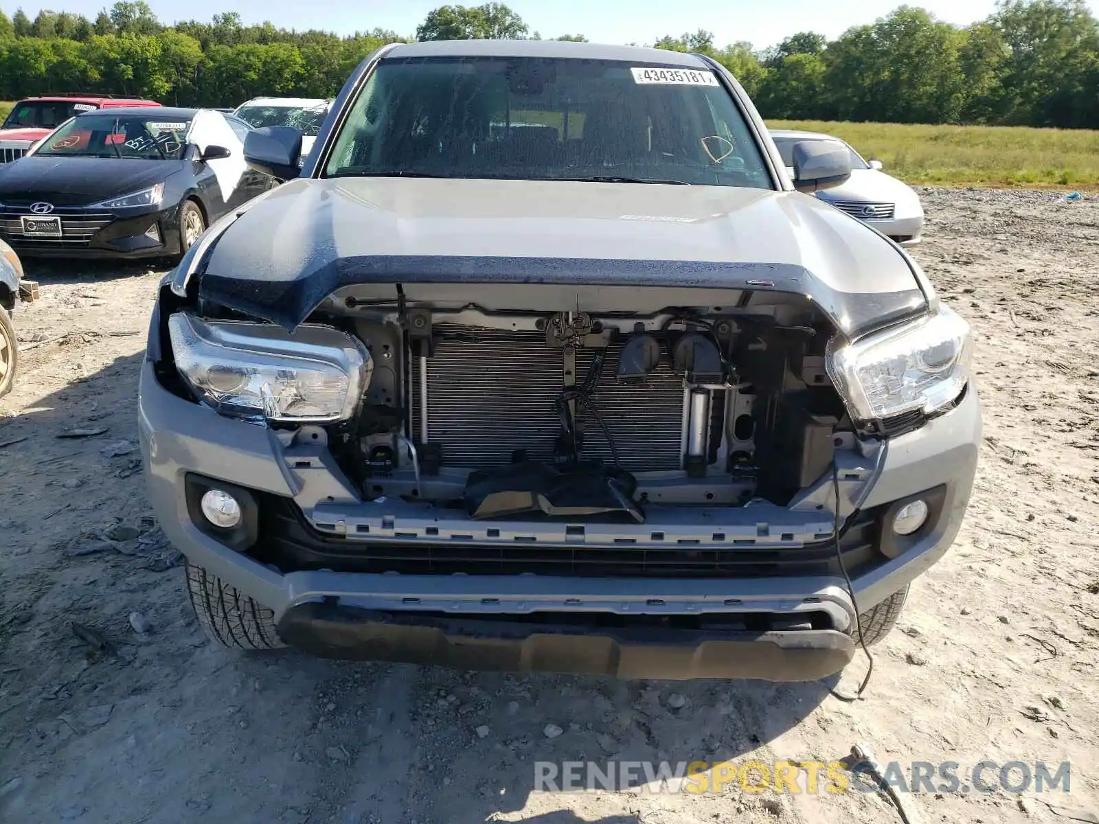 9 Photograph of a damaged car 5TFAZ5CN4MX100971 TOYOTA TACOMA 2021