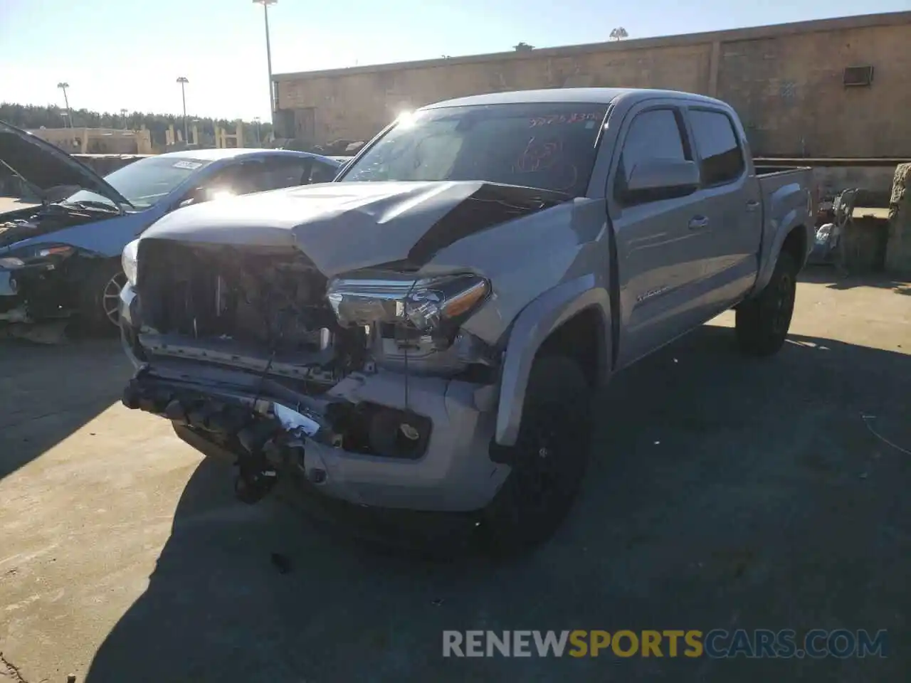 2 Photograph of a damaged car 5TFAZ5CN4MX103580 TOYOTA TACOMA 2021