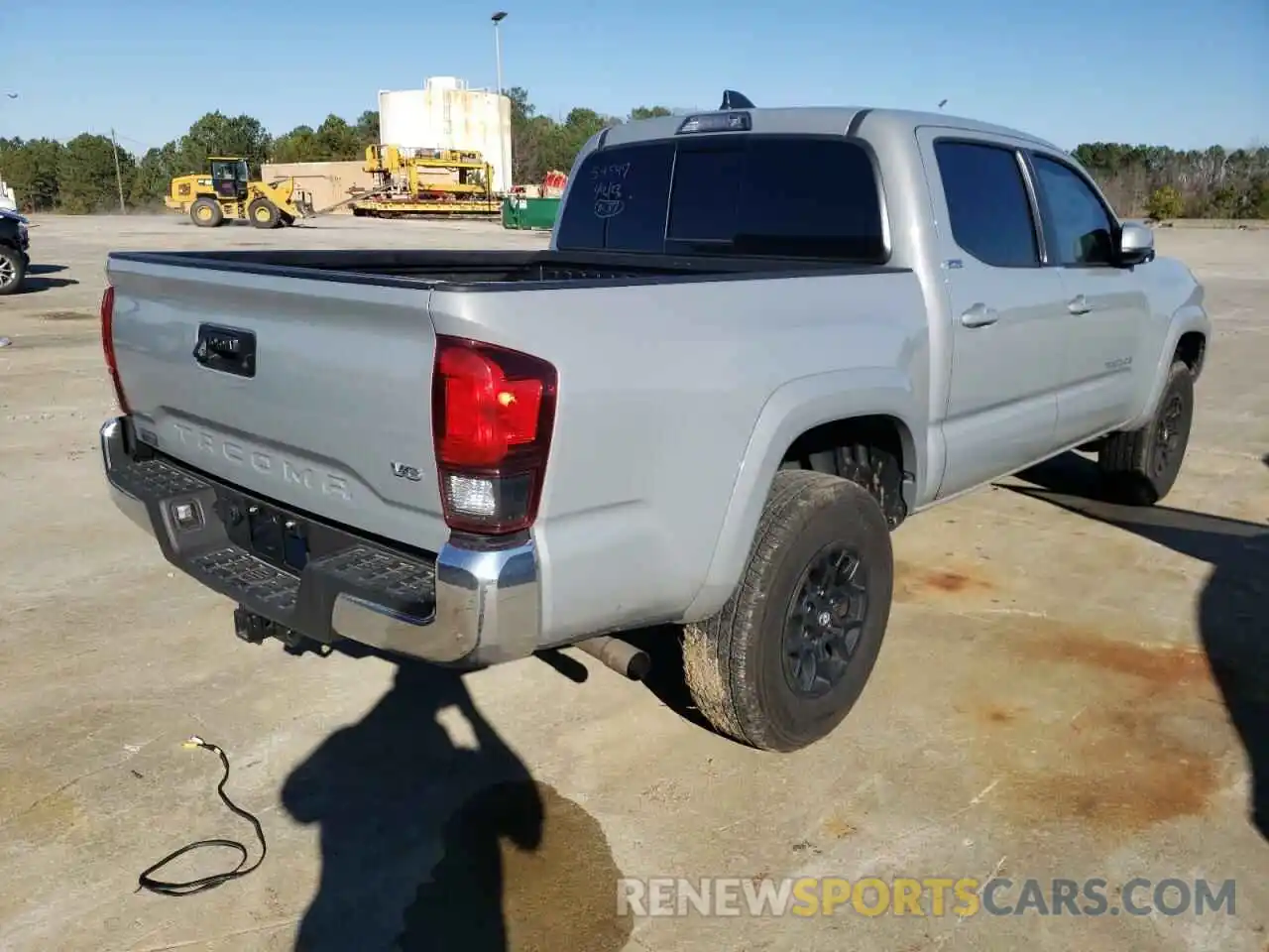 4 Photograph of a damaged car 5TFAZ5CN4MX103580 TOYOTA TACOMA 2021