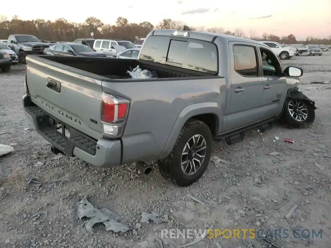 4 Photograph of a damaged car 5TFAZ5CN4MX106656 TOYOTA TACOMA 2021