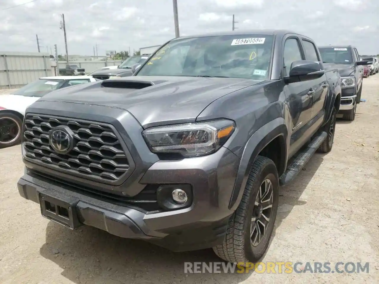 2 Photograph of a damaged car 5TFAZ5CN4MX107340 TOYOTA TACOMA 2021