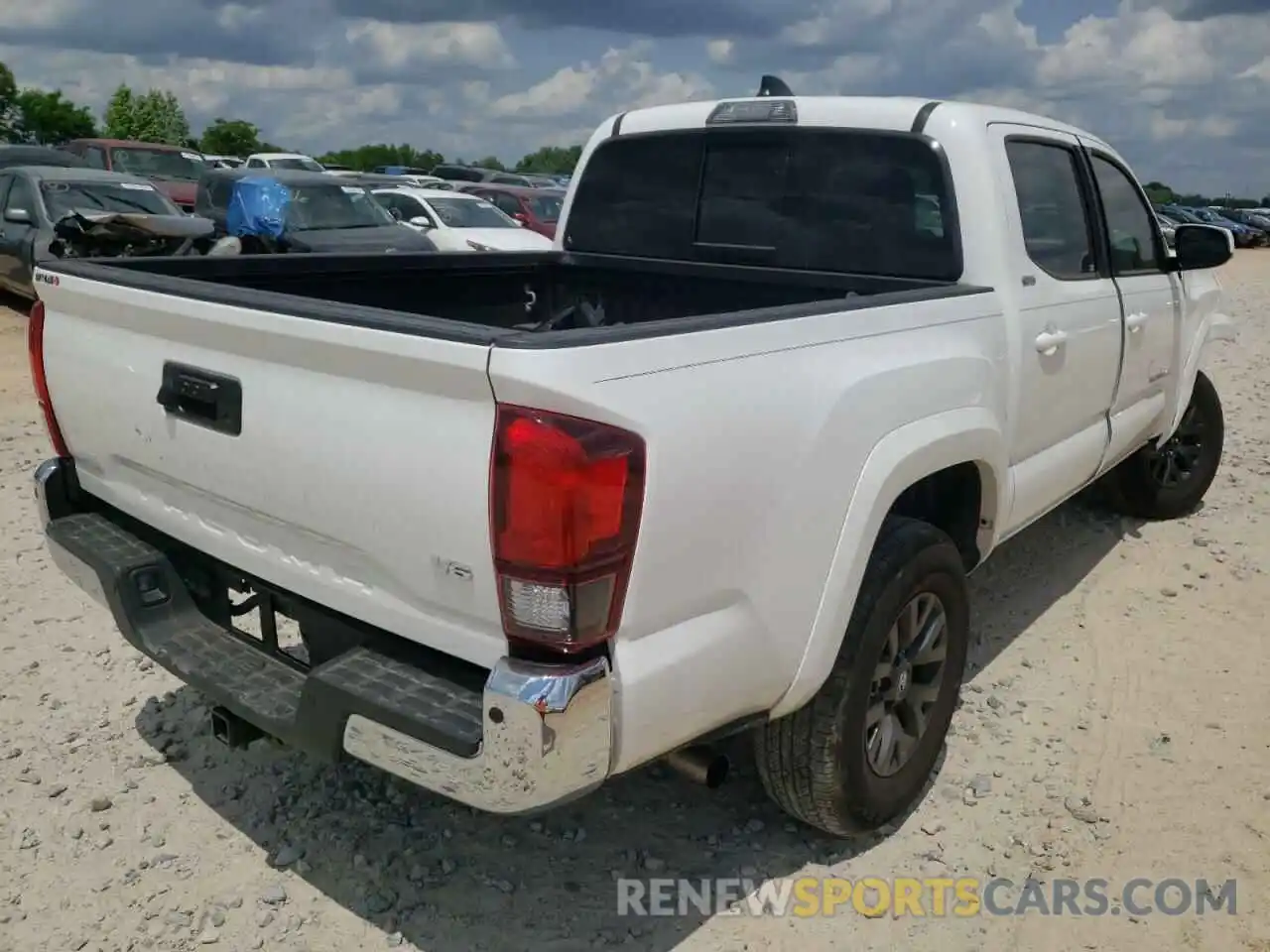 4 Photograph of a damaged car 5TFAZ5CN4MX108908 TOYOTA TACOMA 2021